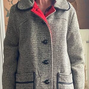 Beautiful tweed coat with leather trim. Purchased too large. Size 12,
